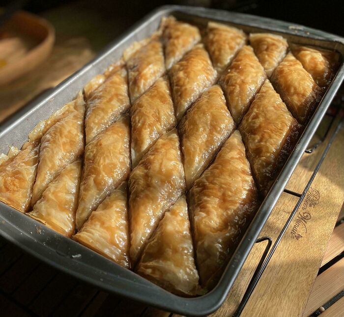 Golden baklava, perfectly layered and glazed, showcasing a baker’s sweet success.