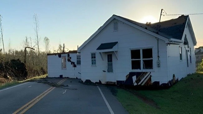 Battle Between a Tornado and a Home