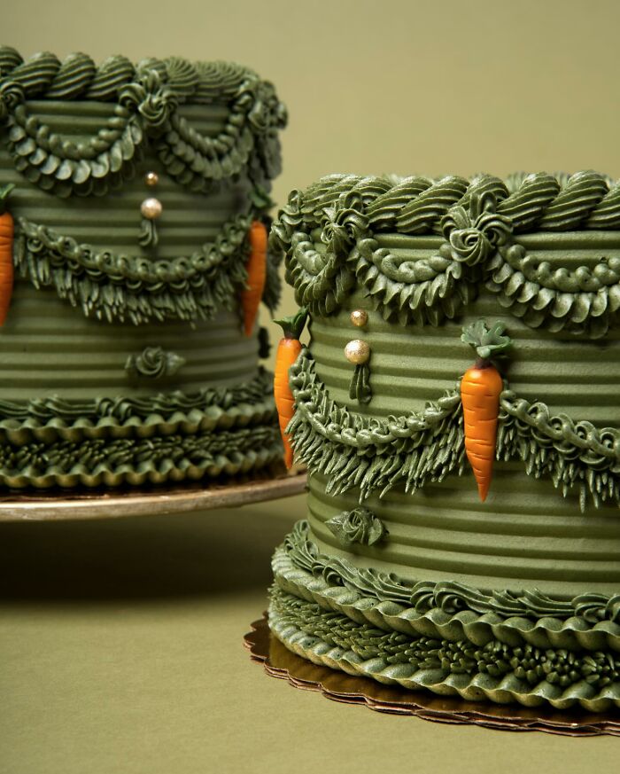 Lush green vegan cakes with intricate icing and cute carrot decorations.