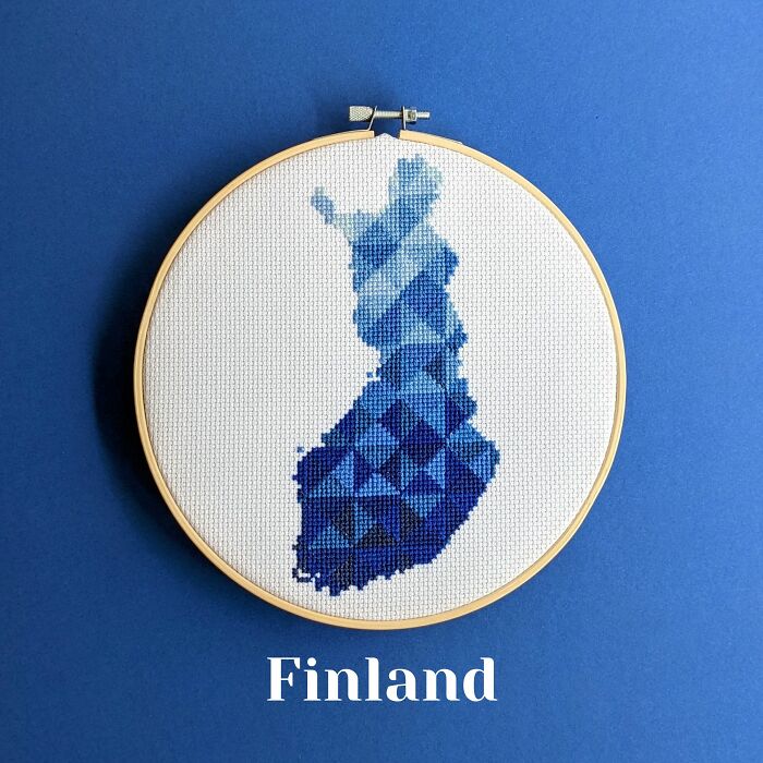 Finland’s map in soothing blue tones, carefully stitched and framed in a hoop on a matching blue background.